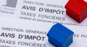 Taxe foncière après une vente : qui doit payer en 2026 et comment arrêter les prélèvements ?