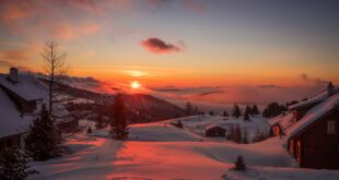 Village de montagne enneigé pendant les vacances d'hiver 2027